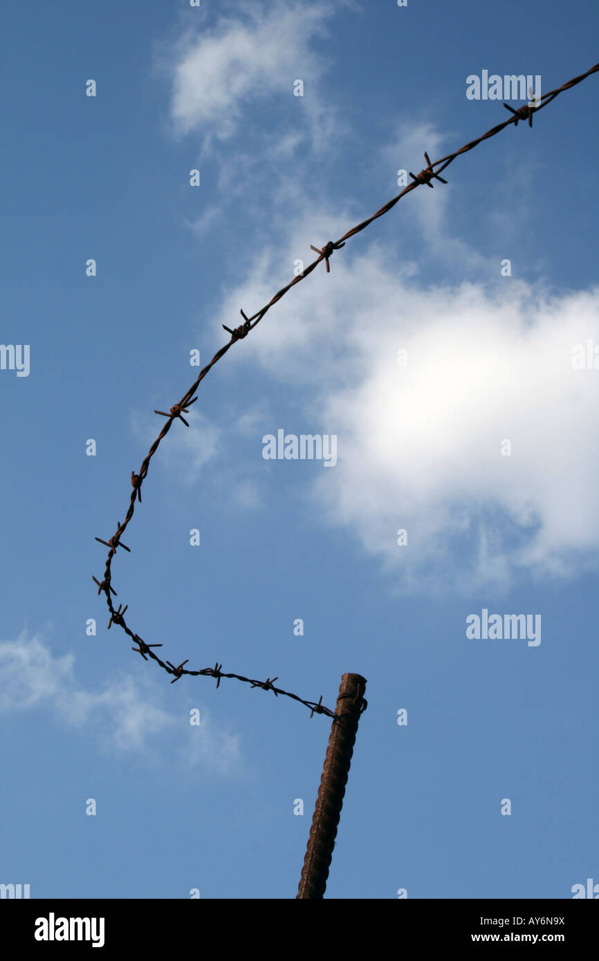 old rusted barbed wire fence in countryside Stock Photo - Alamy