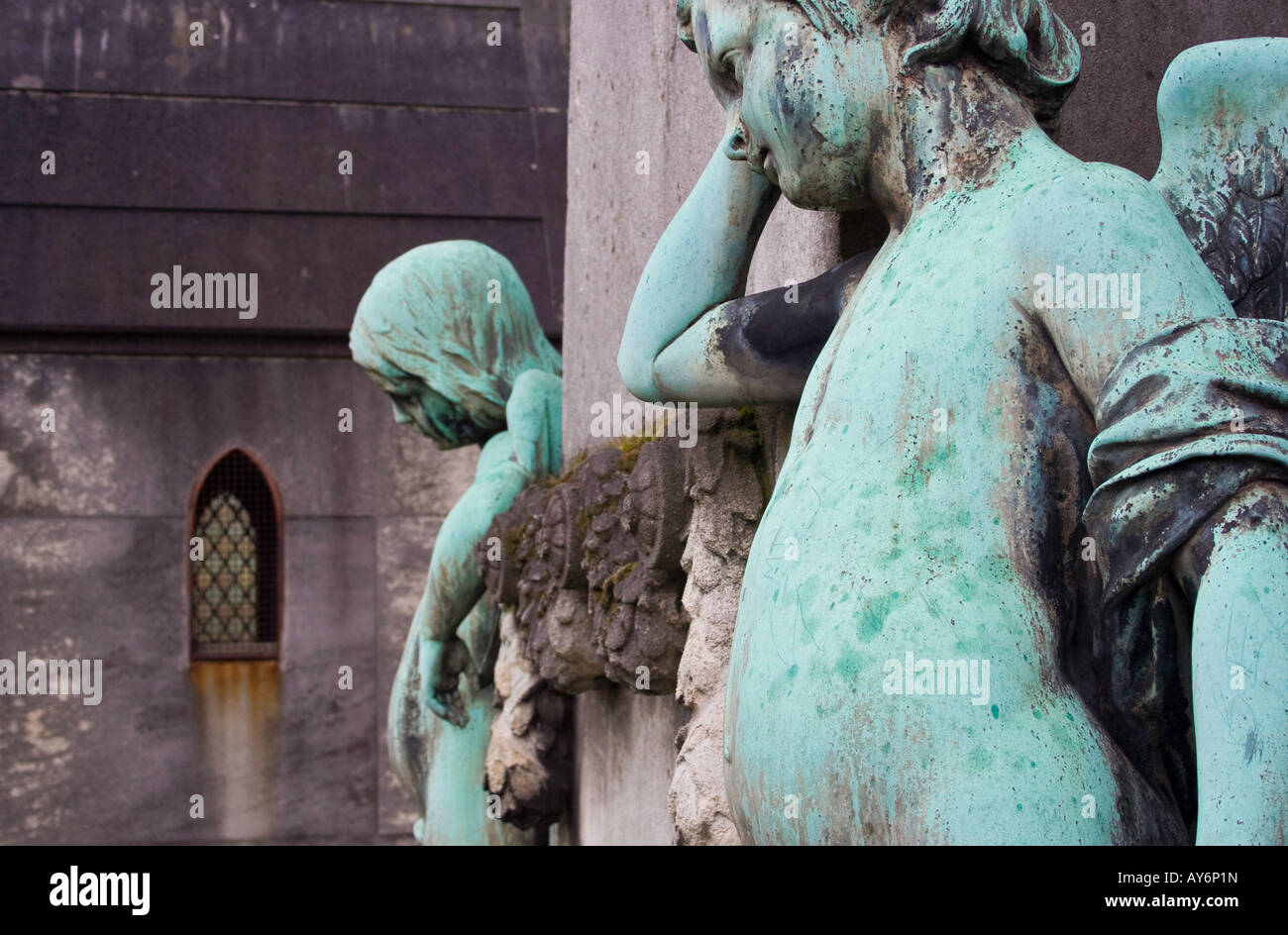 Copper angels adorn a tomb at Pere Lachaise cemetery Paris Stock Photo