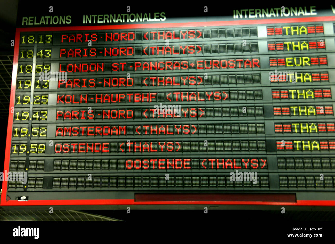 International train departures board in Brussels Midi station Stock Photo
