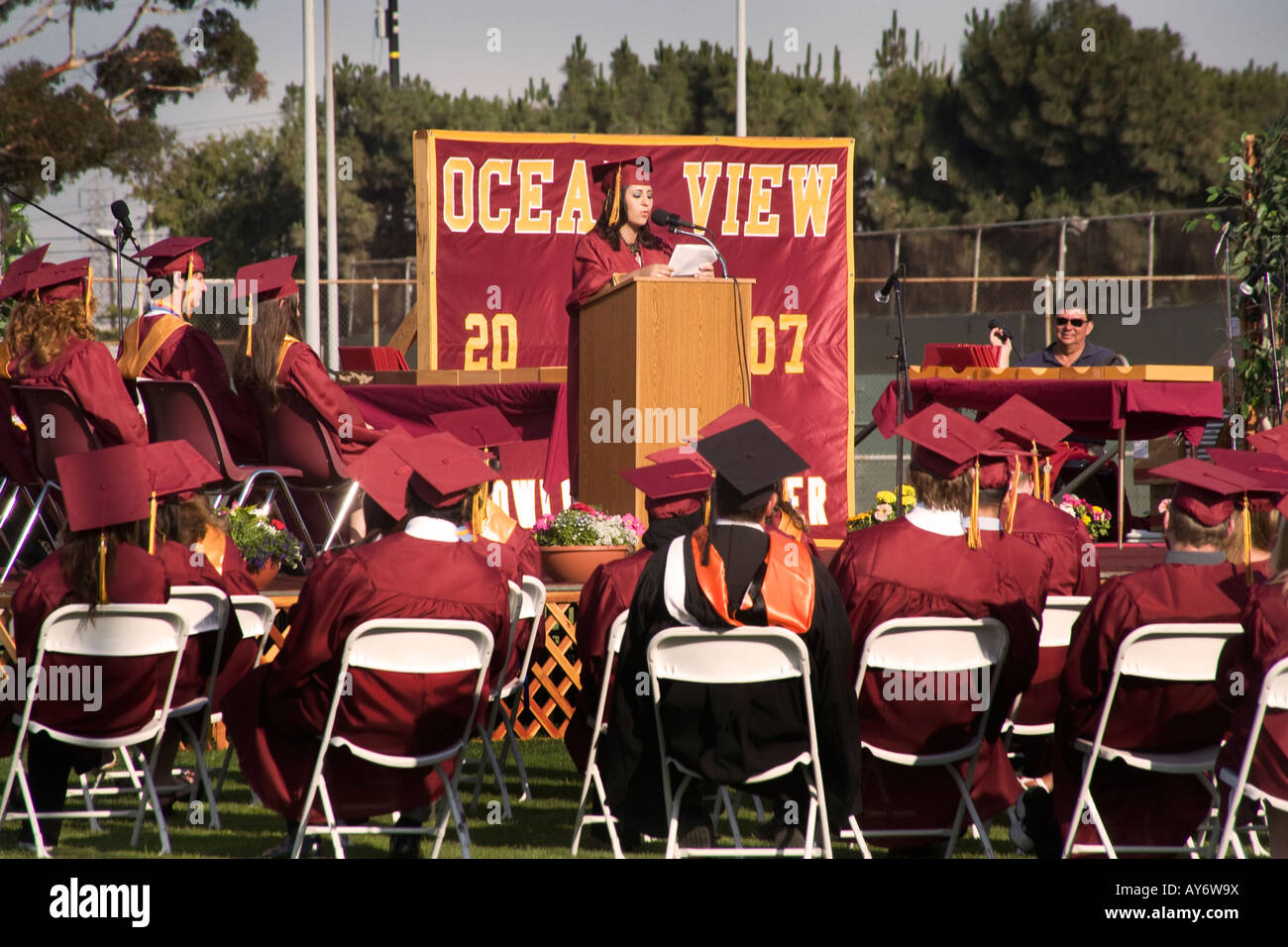 A high school senior of Middle Eastern origin speaks at graduation Stock Photo