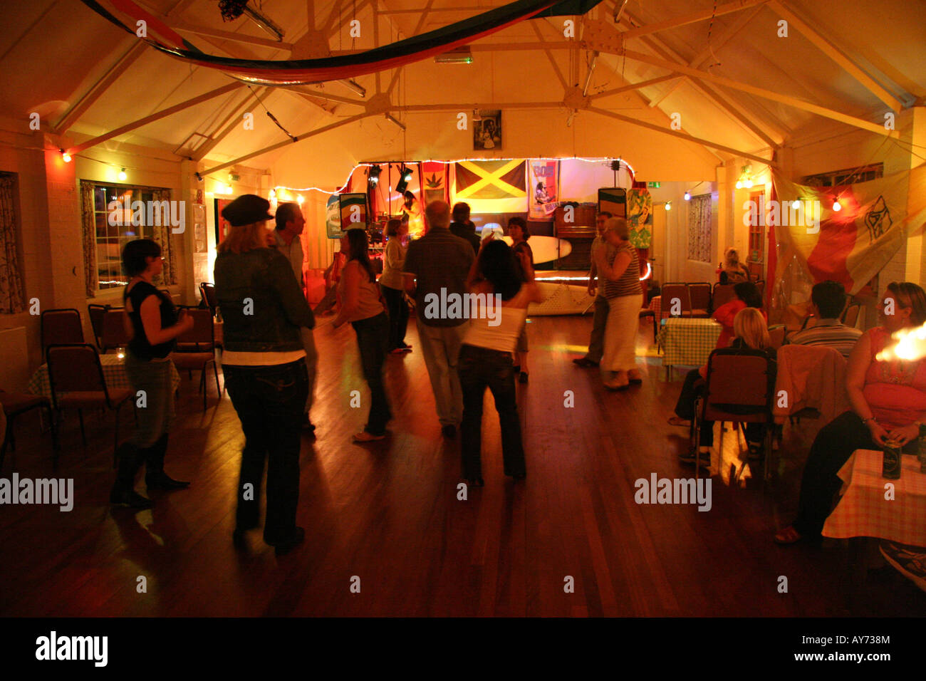 People dance in a decorated Suffolk village hall Stock Photo Alamy
