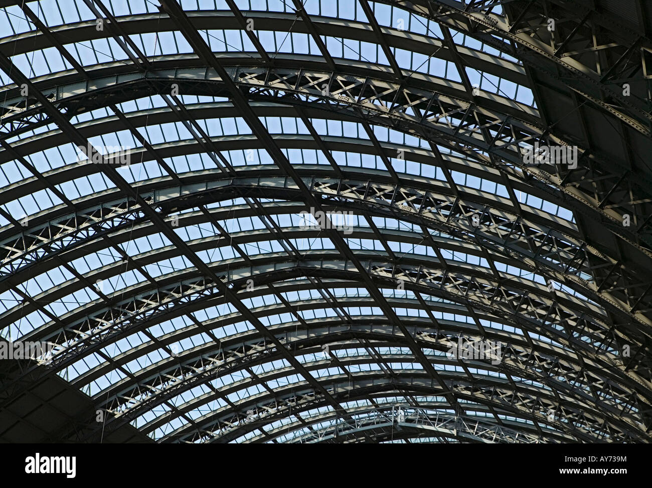 roof construction of railway station glass steel metal train transport sky urban architecture Europe Germany Stock Photo