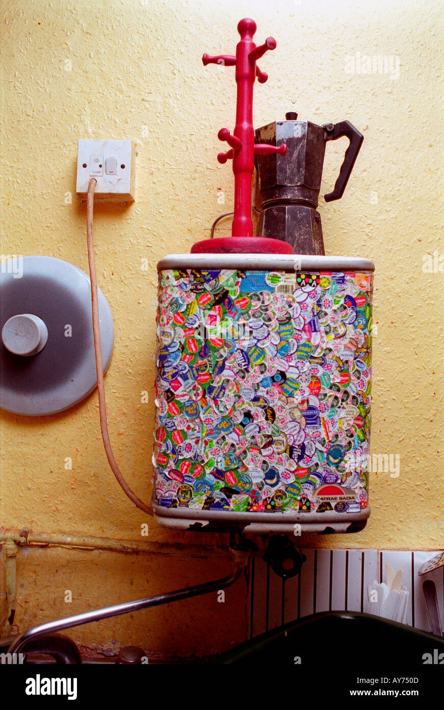 Decorated water heater in kitchen at Saint Agnes Place squat. Stock Photo