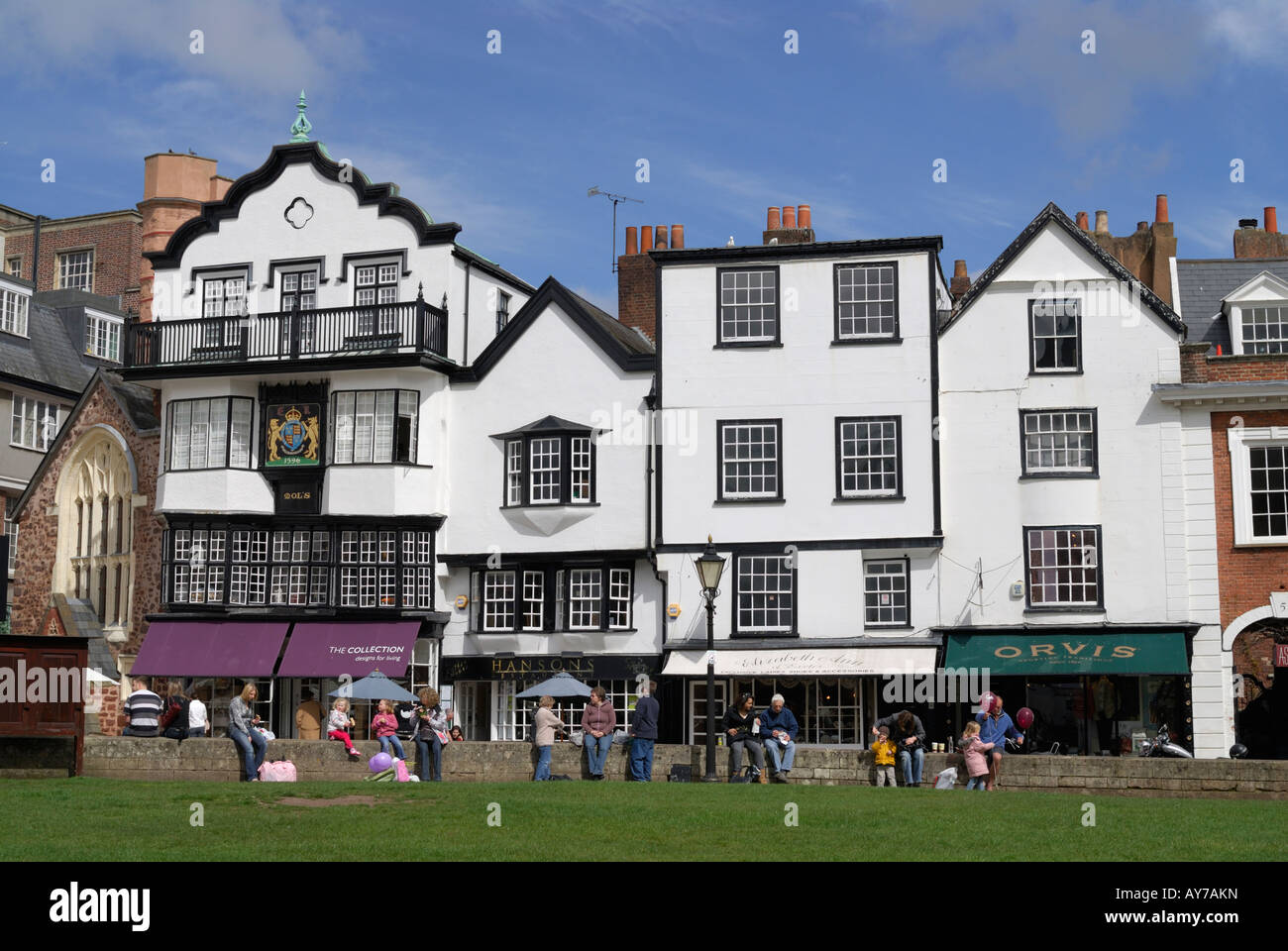 View of historic buildings on Cathedral Yard in Exeter, England, on a sunny spring day Stock Photo