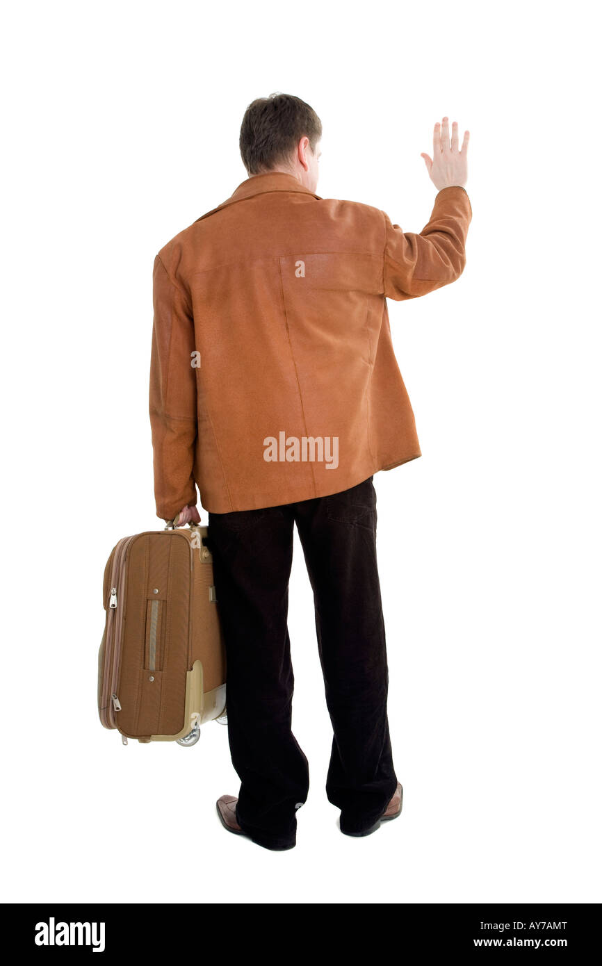 Man in brown jacket with suitcase Stock Photo Alamy