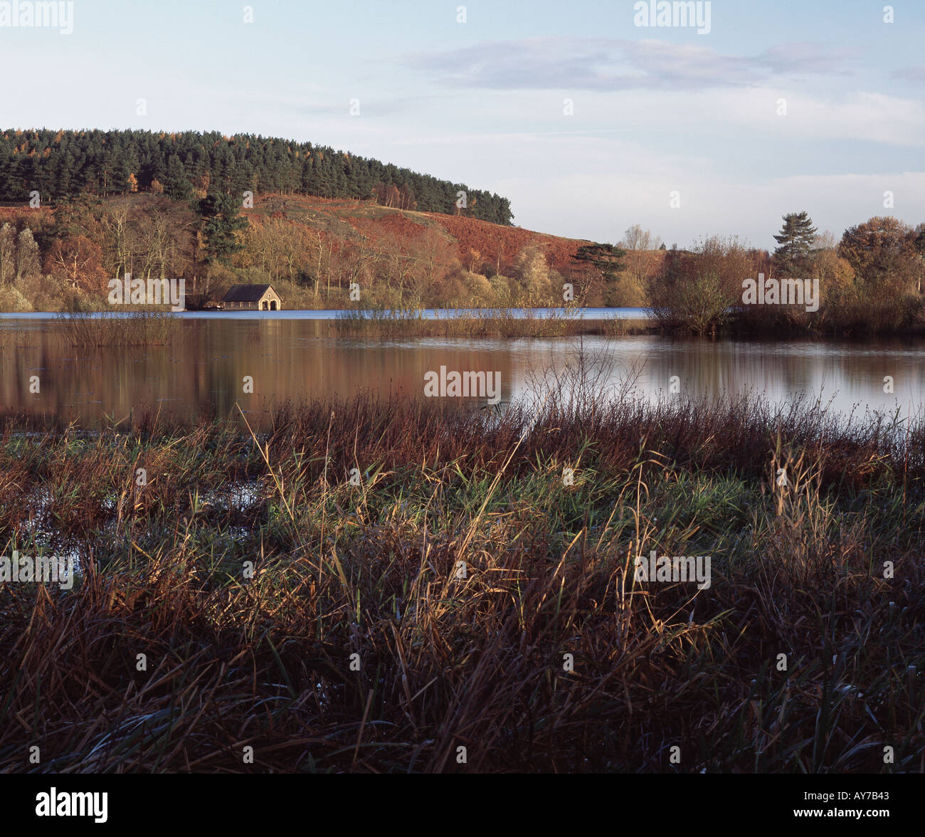 Cropston reservoir Leicestershire with boathouse at first light Stock Photo