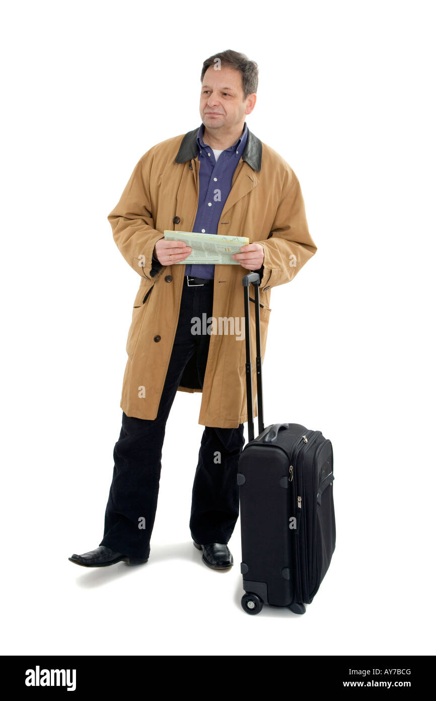 Man in brown jacket with black suitcase Stock Photo Alamy