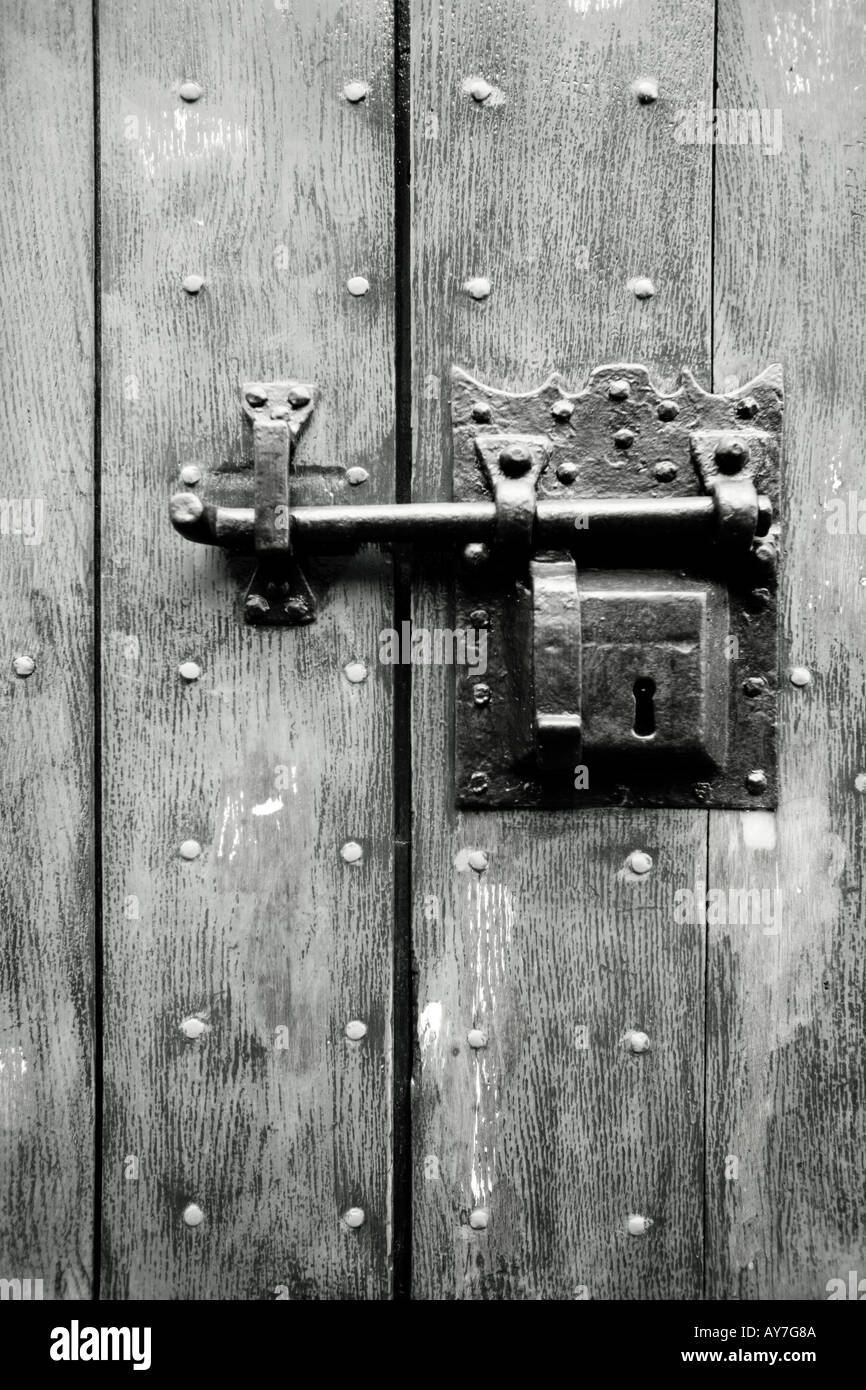 black white photo of door lock on wooden door Stock Photo - Alamy
