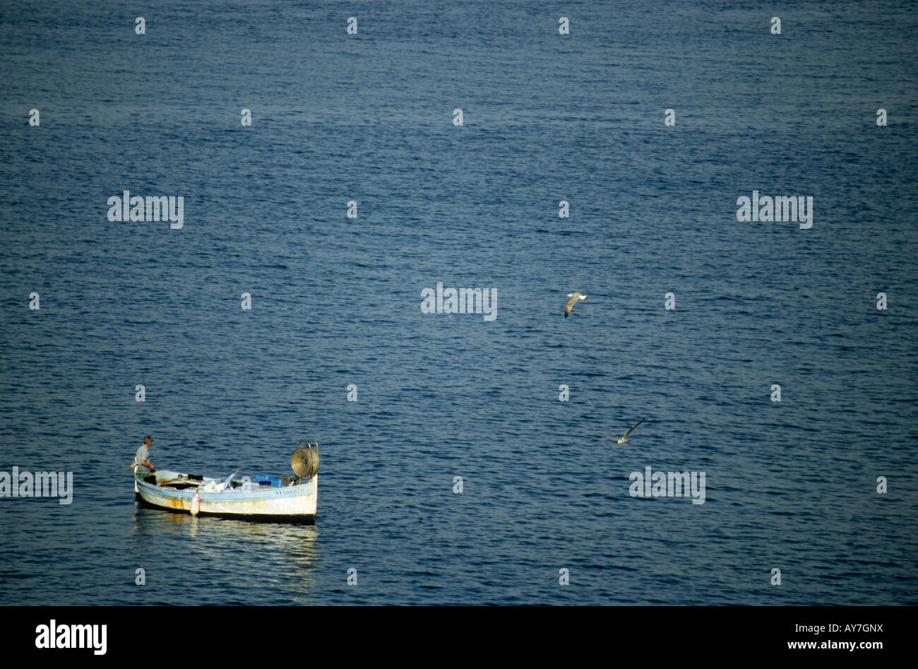 Fisherman on small boat hi-res stock photography and images - Alamy