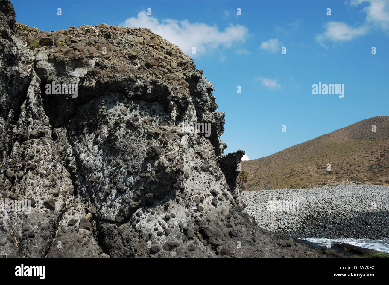 Volcanic ash and debris flow deposit on the coast of the Mediterranean sea.  Almeria, Spain Stock Photo - Alamy