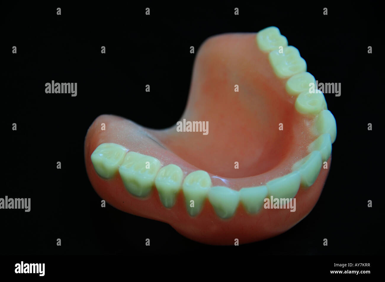 Upper denture and a black back drop. background, teeth, whitening, oral ...