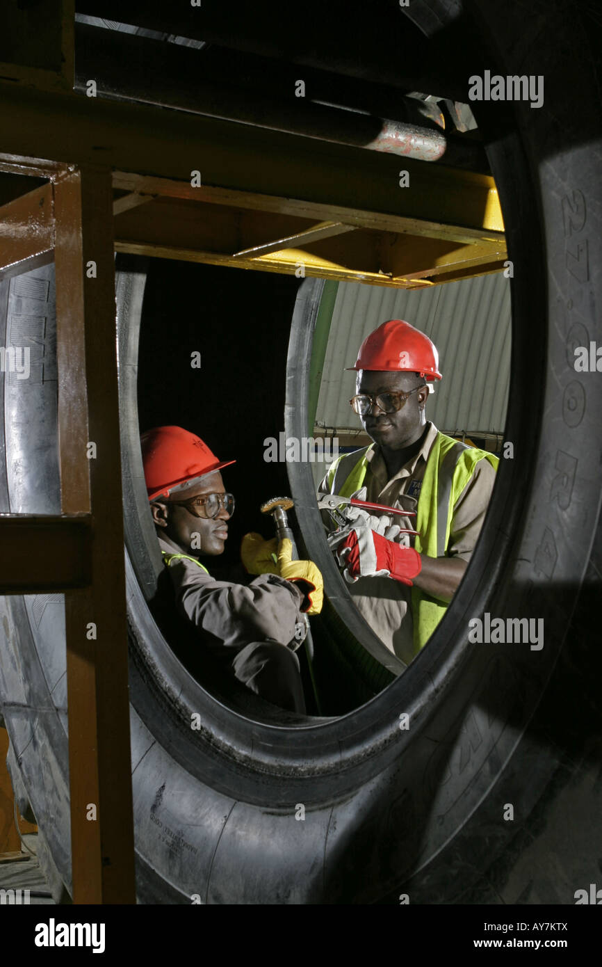 Repairing rubber tyre from Caterpillar haul truck mining vehicle in
