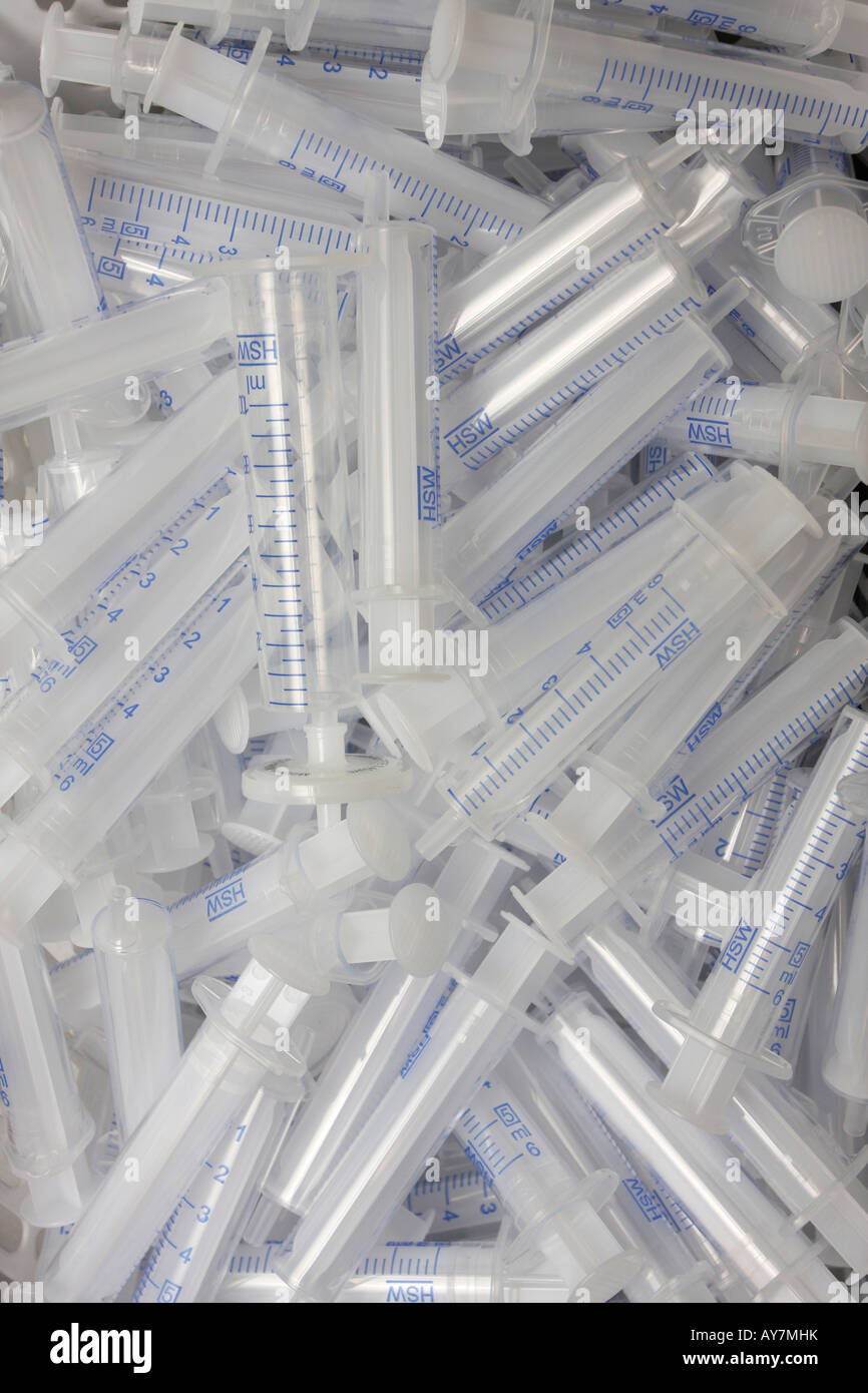 A pile of unused syringe plungers great for scientific backgrounds or