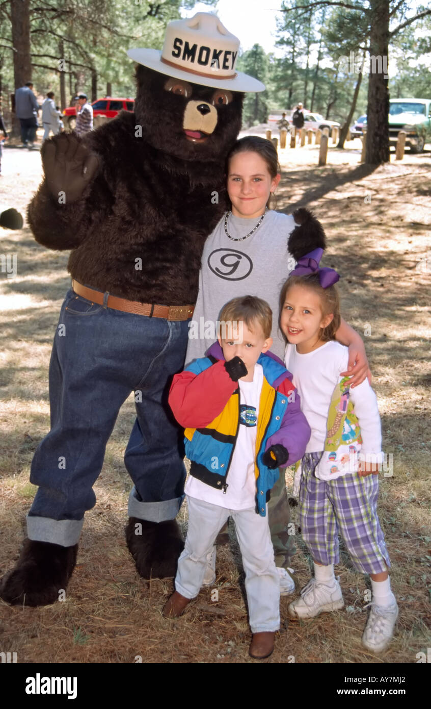 MR 0459 0458 A group of children meet Smokey Bear in Ruidoso, New Mexico. Stock Photo
