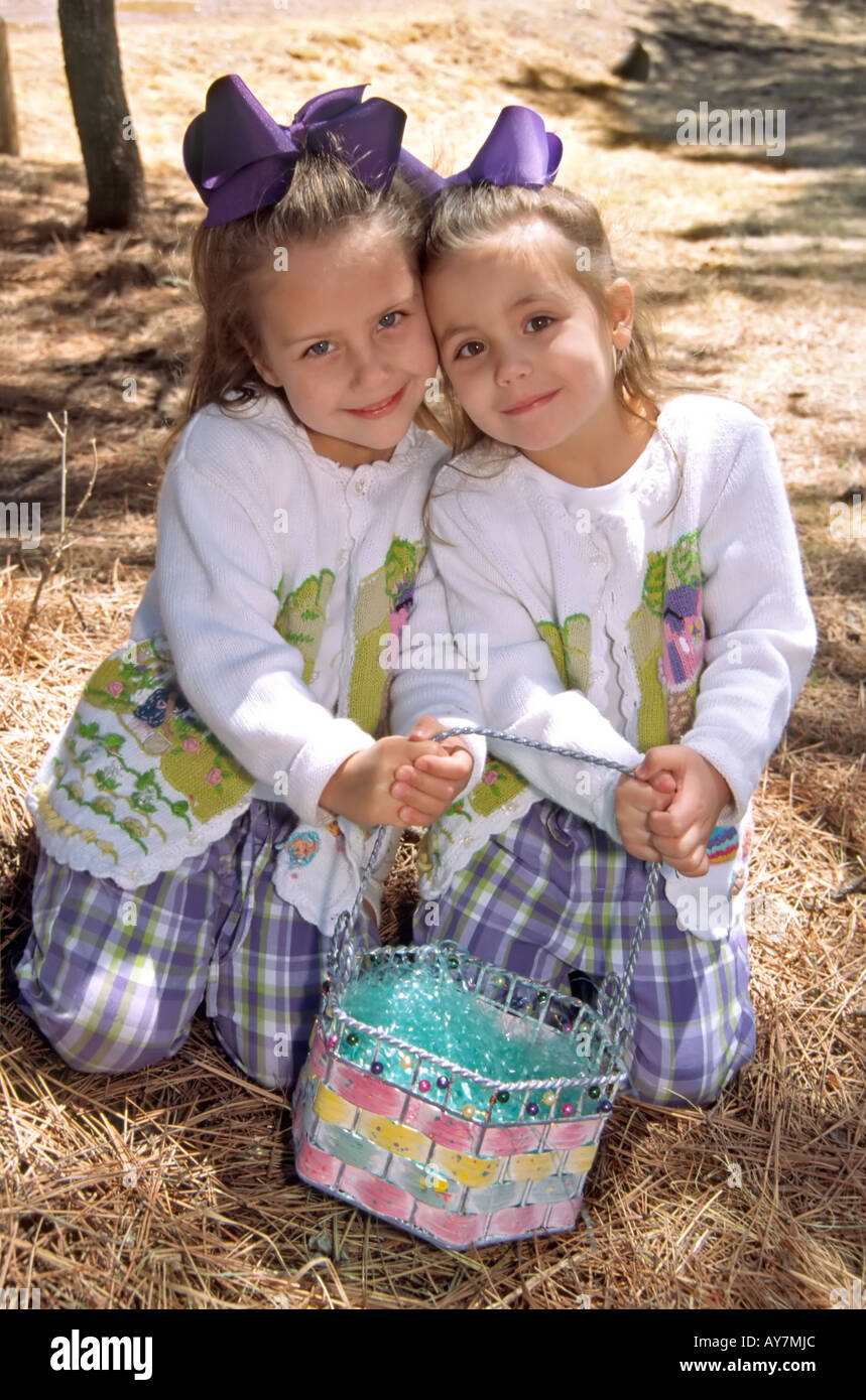 MR 0460 0459 Reagan Branch and Addison Sanders are cute cousins ready for the annual Easter Egg Hunt in Ruidoso, New Mexico. Stock Photo