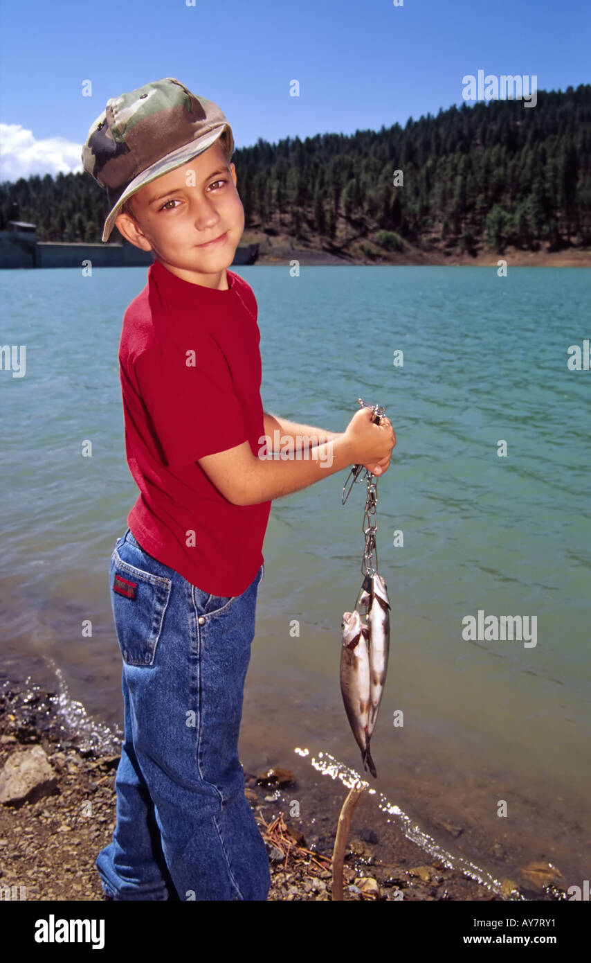 MR 591 Master fisherman Cody Sanderson presents a fine stringer of trout, at Fishing Day in