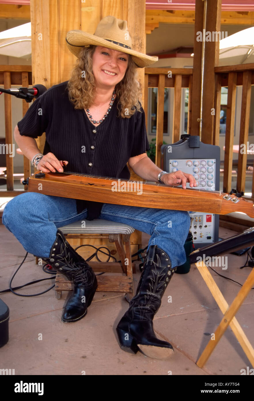 Cowgirl playing dulcimer hires stock photography and images Alamy