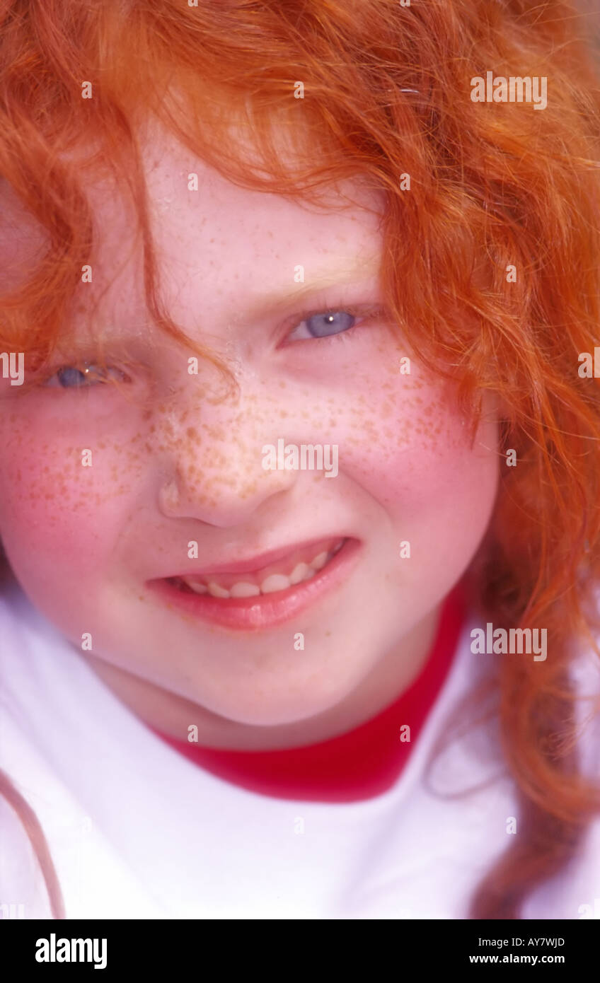 MR 0370 A portrait of a smiling young girl with red hair and freckles, in Ruidoso, New  Mexico. Stock Photo