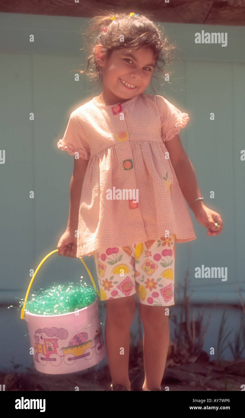 A portrait of a young girl wearing her new spring Easter outfit in Ruidoso, New  Mexico. Stock Photo