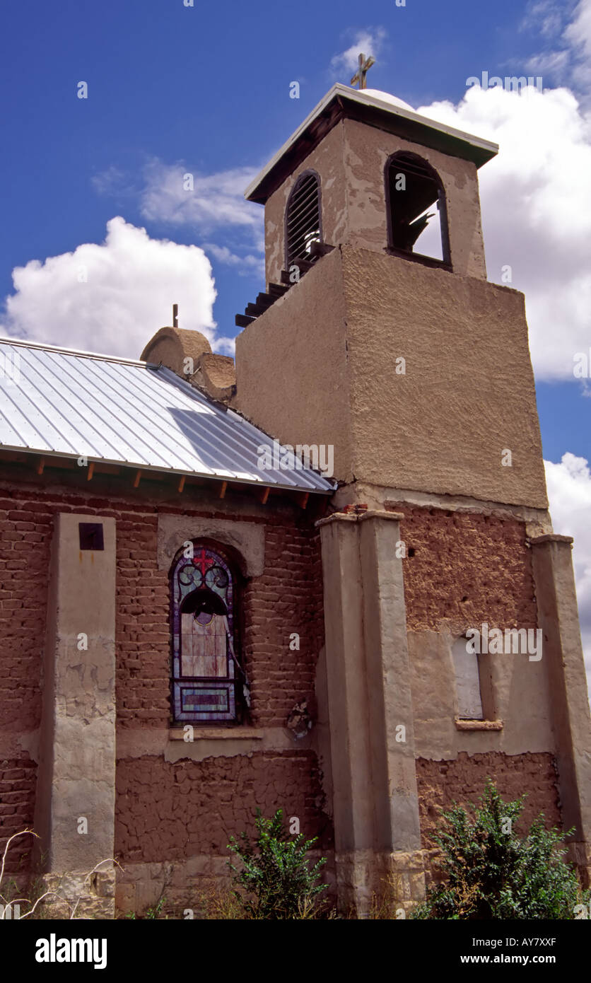 Our Lady of Light church, a fine adobe chapilla (church), is undergoing restoration by  volunteers in Lamy, New Mexico. Stock Photo