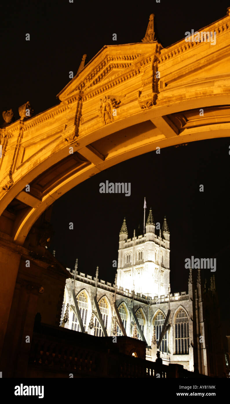 Night photograph of the south face of Bath Abbey with the Roman Baths ...