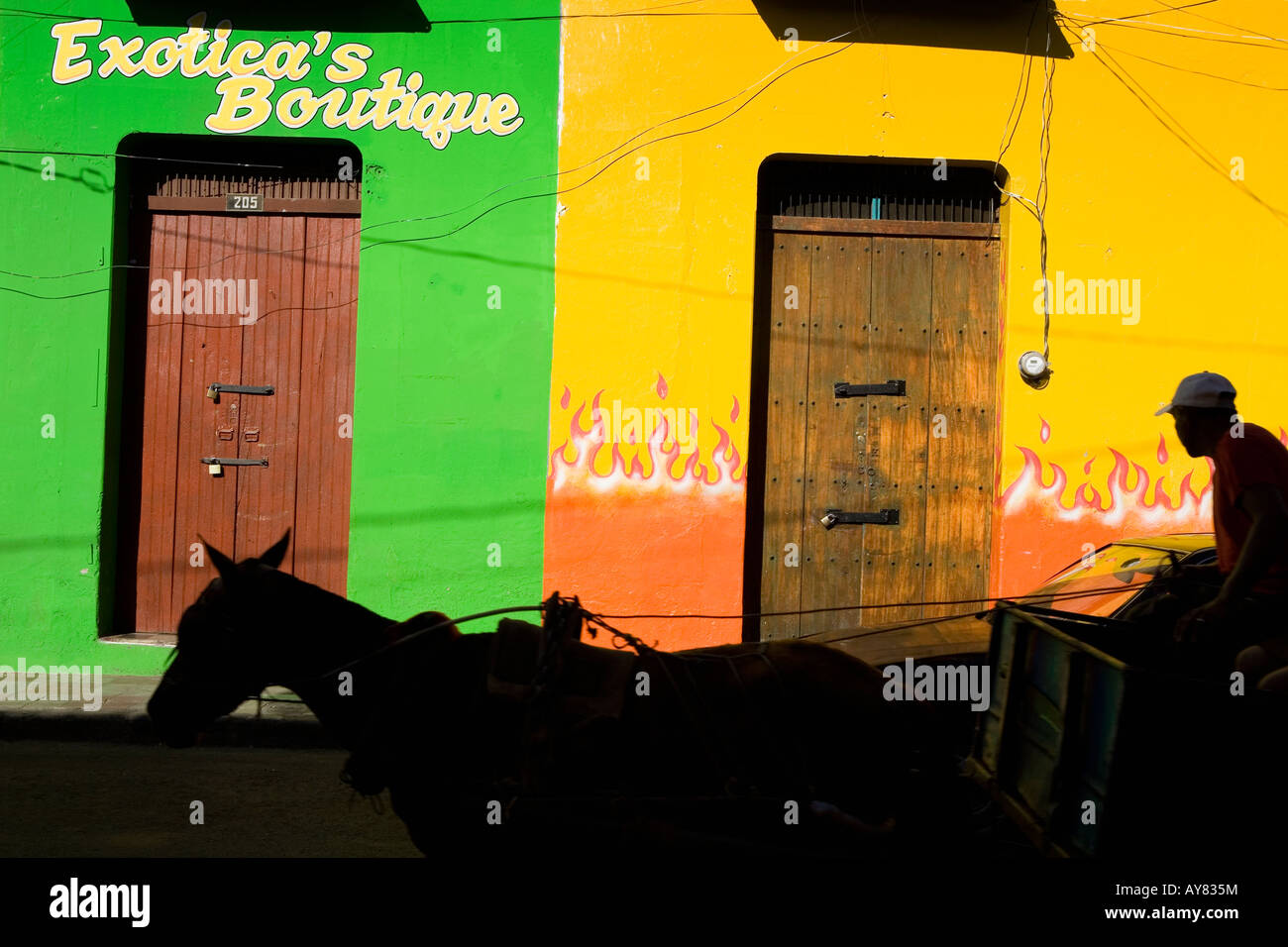 Street color and silhouette horse man and cart Leon Nicaragua Stock Photo