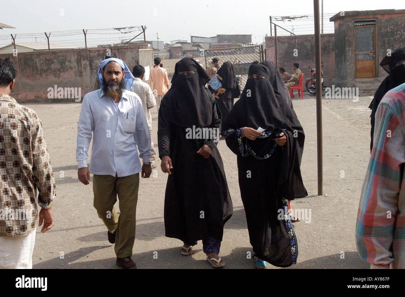 One man and two women going to cast vote in Indian elections Stock Photo