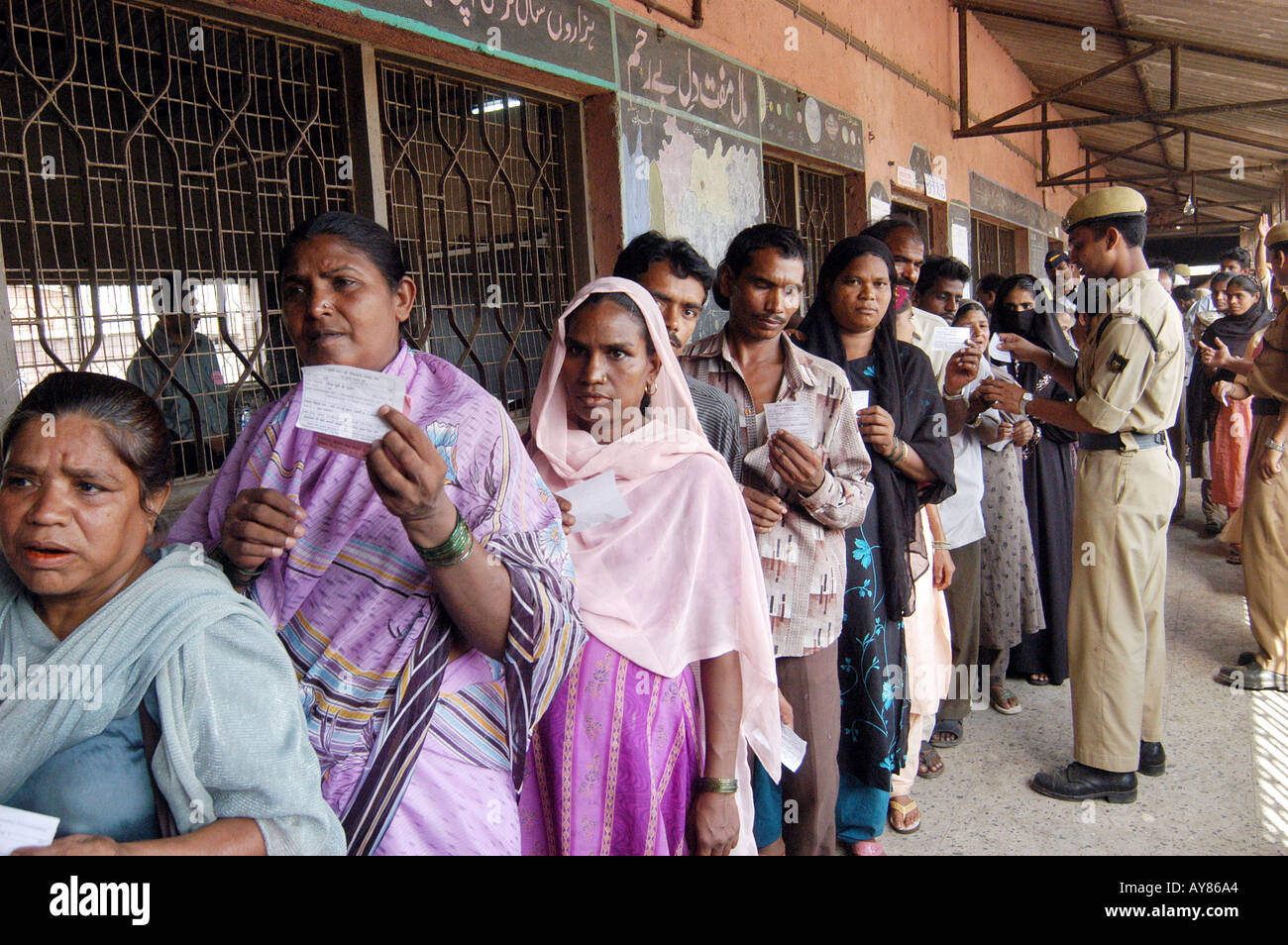 Waiting with patience in line for voting in Indian elections Stock Photo