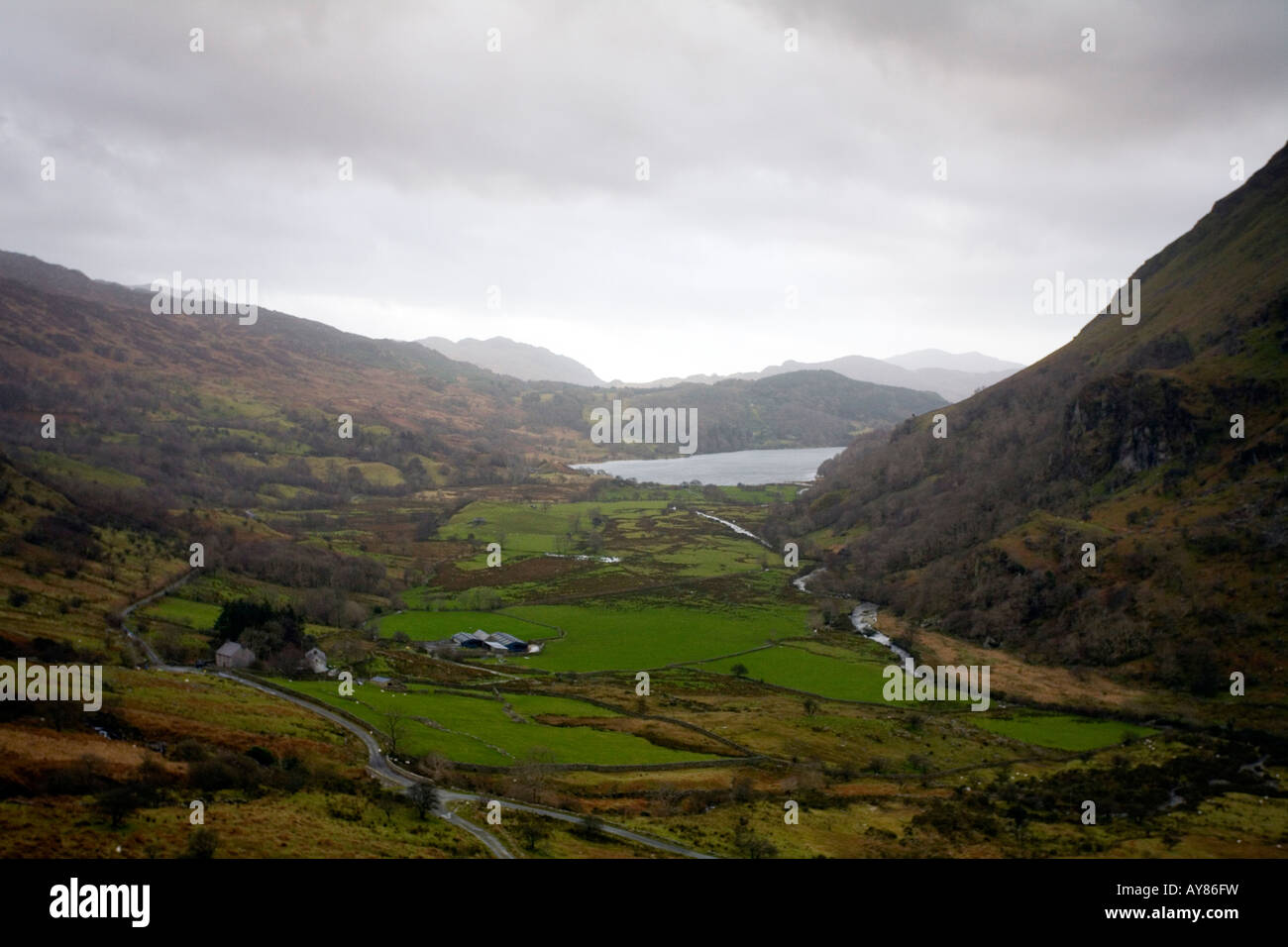 View down a valley towards Llyn Gwynant Snowdonia Wales UK Stock Photo
