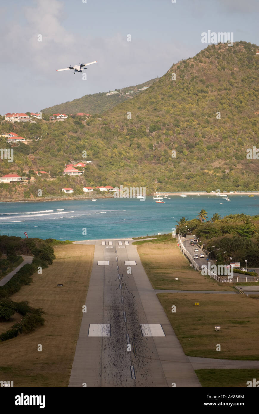 The airport and runway on the island of St. Barts in the french west ...
