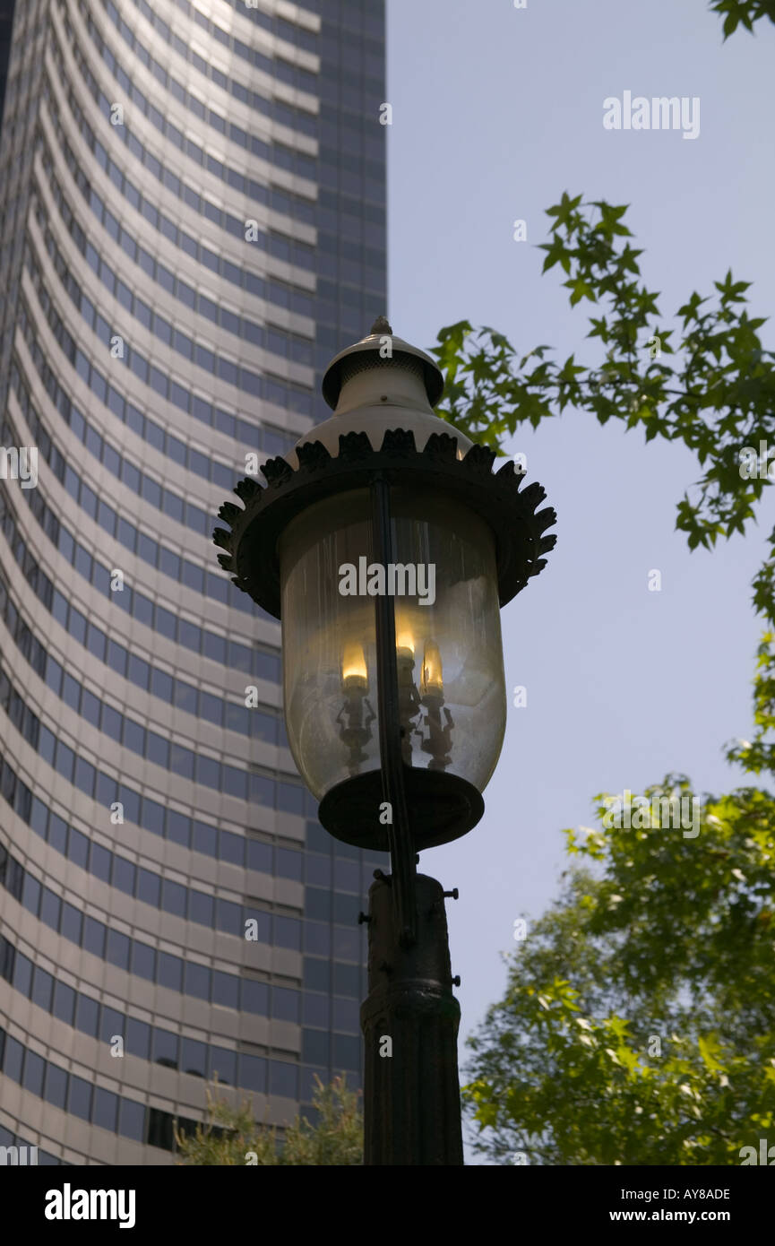 Gas light street lamp and Columbia Center Tower building Seattle