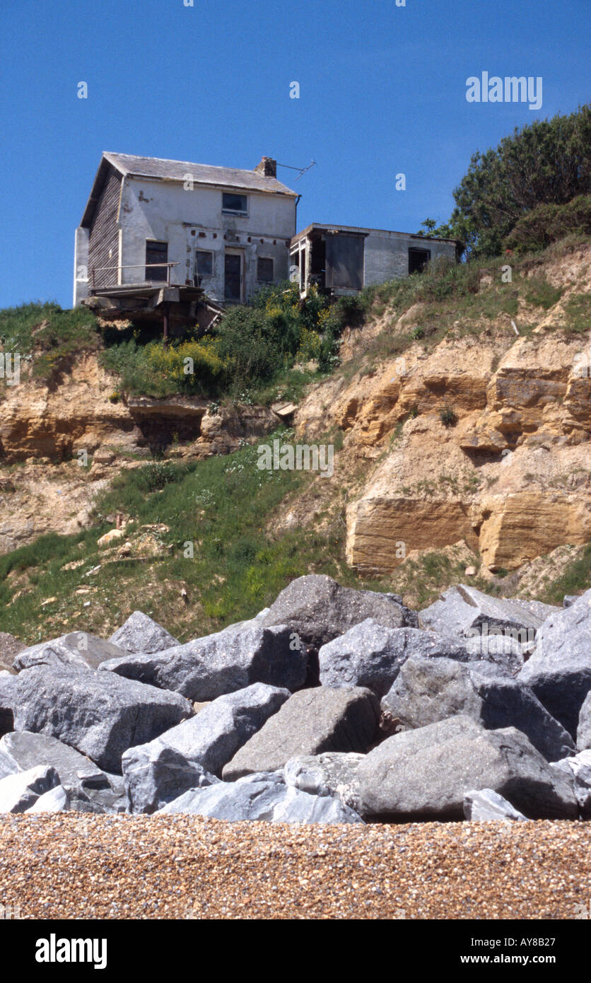 Cliff erosion and sea defences at Fairlight East Sussex England South Coast Britain Stock Photo