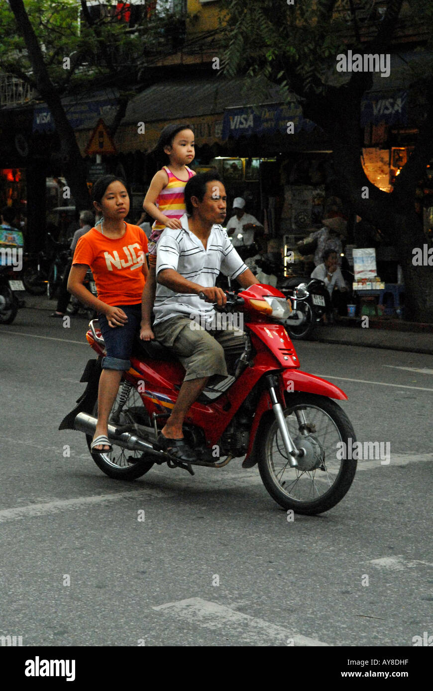 Vietnamese Motorcycle Rider Vietnamese Family Riding A Motorcycle High Resolution Stock Photography ...
