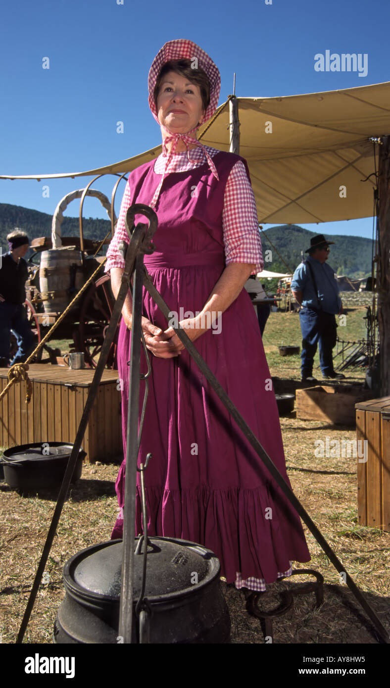 MR 426 Pioneer Glenda Love tends to her cast-iron cooking, at the Lincoln County Cowboy Symposium, in Ruidoso Downs, New Mexico. Stock Photo