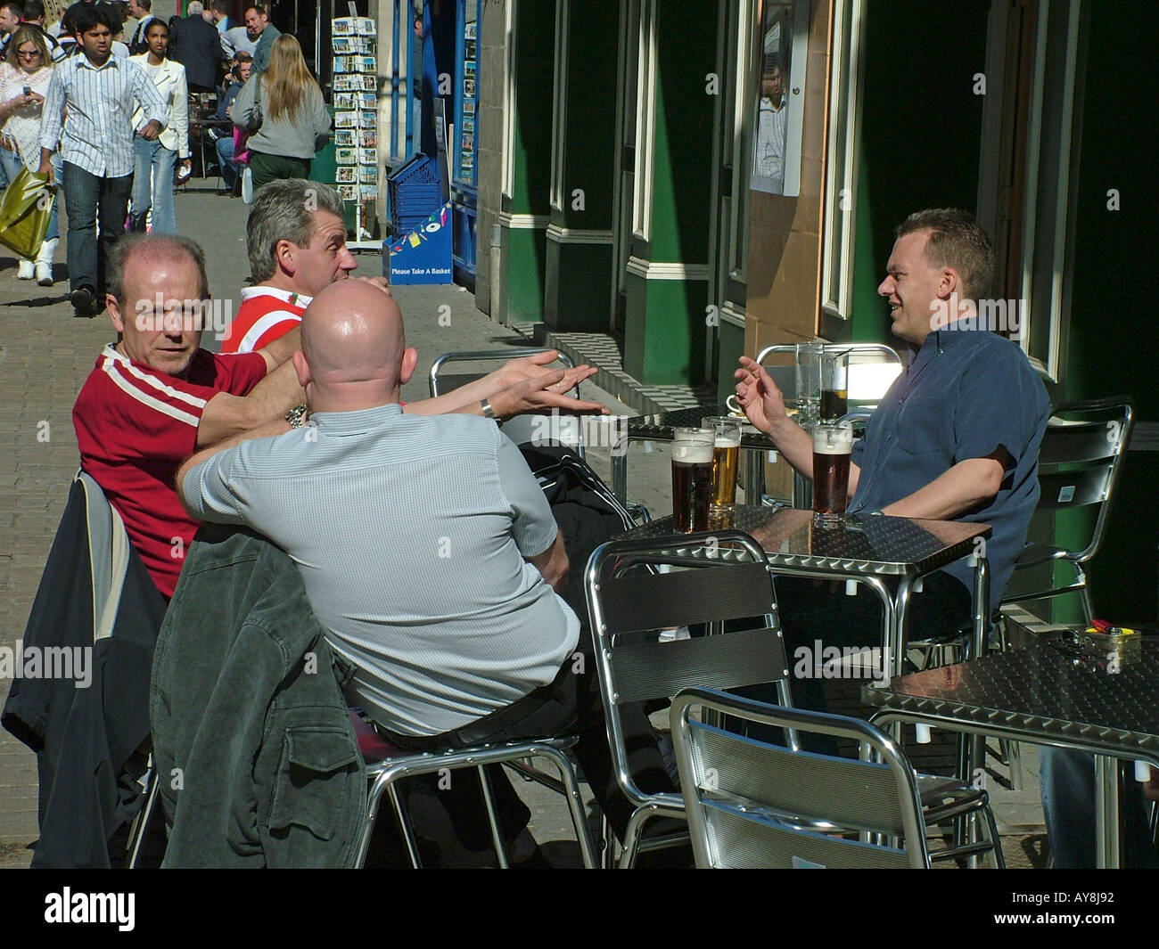 Rugby fans drinking outside the Old Arcade, Cardiff City Centre, Wales Stock Photo