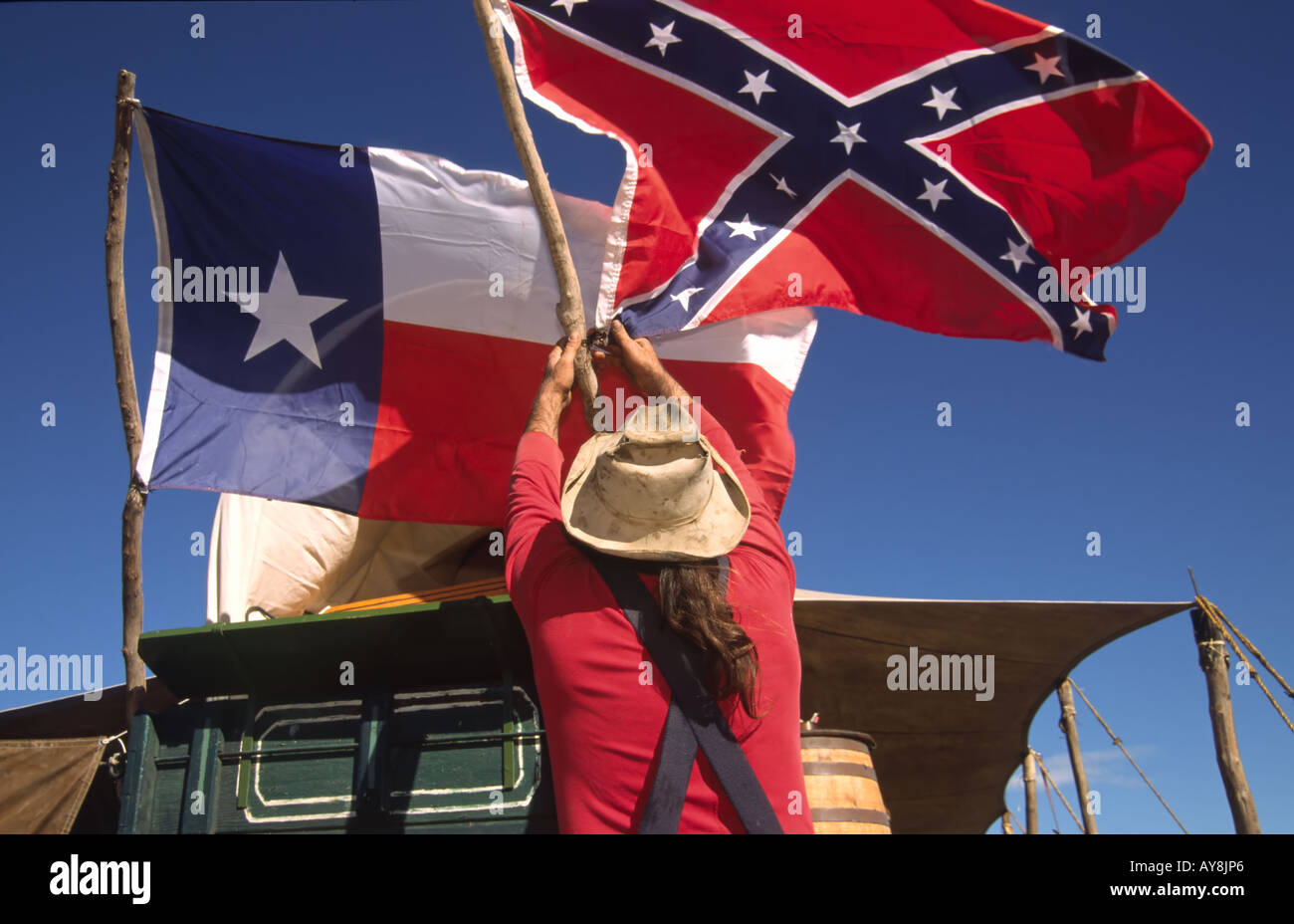 Flags of Texas and the Confederacy snap in the breeze, at the Lincoln