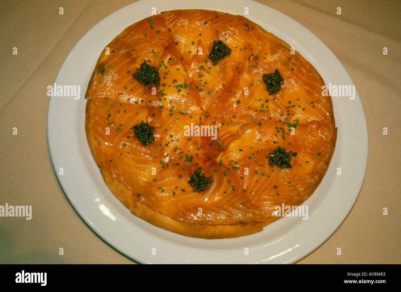 Salmon pizza with capers and chives a Wolfgang specialty Spago Restaurant Caesars Palace hotel Las Vegas NV Nevada Stock Photo