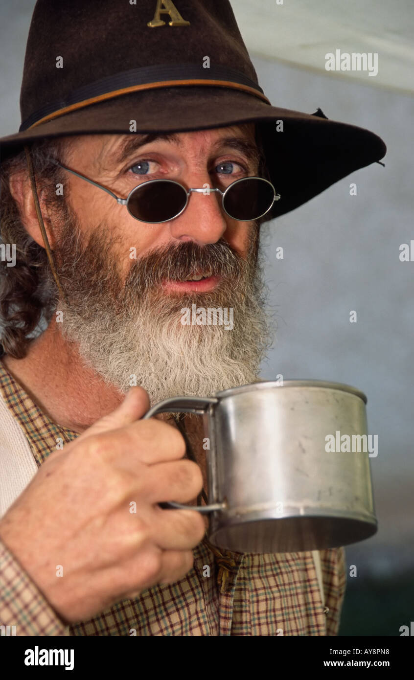 MR 0364 Leonard Clapes has a tin cup of cowboy coffee, at 'Old Lincoln Days' in Lincoln, New  Mexico. Stock Photo