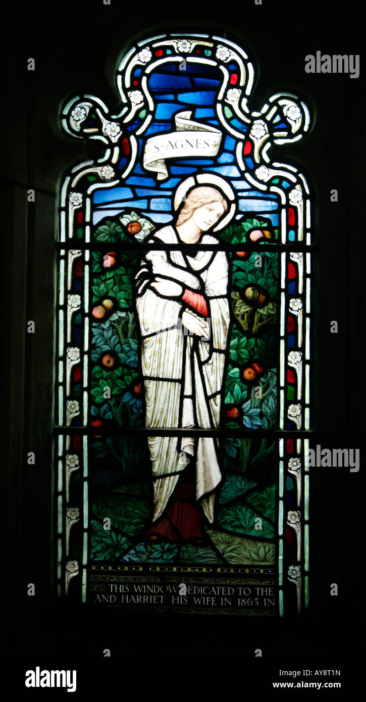 Stained Glass Window dedicated to Saint Agnes Gloucester Cathedral by Morris and Co. from a painting by Edward Burne-Jones Stock Photo