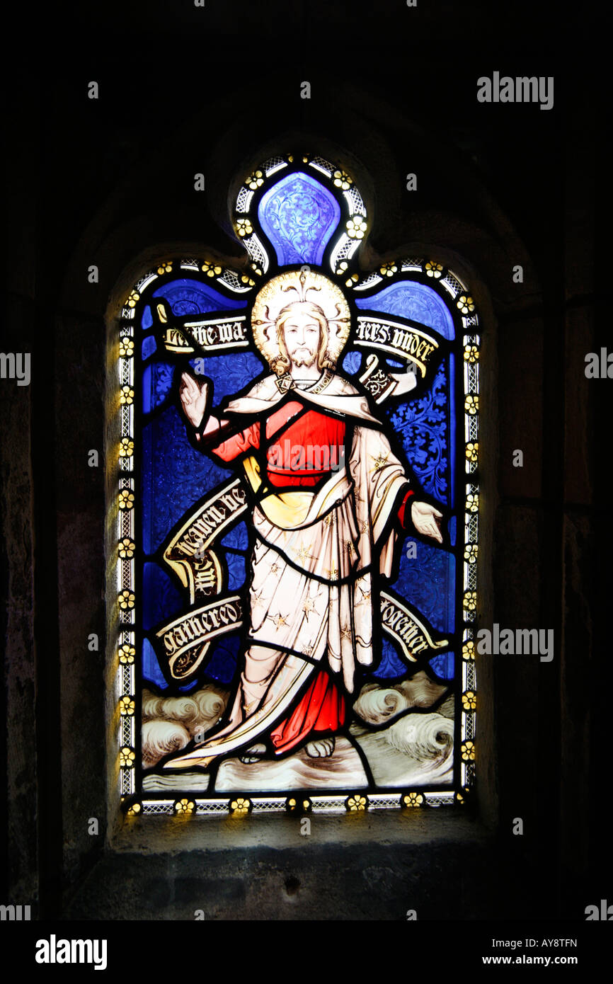 Stained Glass Window depicting Jesus Christ walking on water Gloucester Cathedral Stock Photo