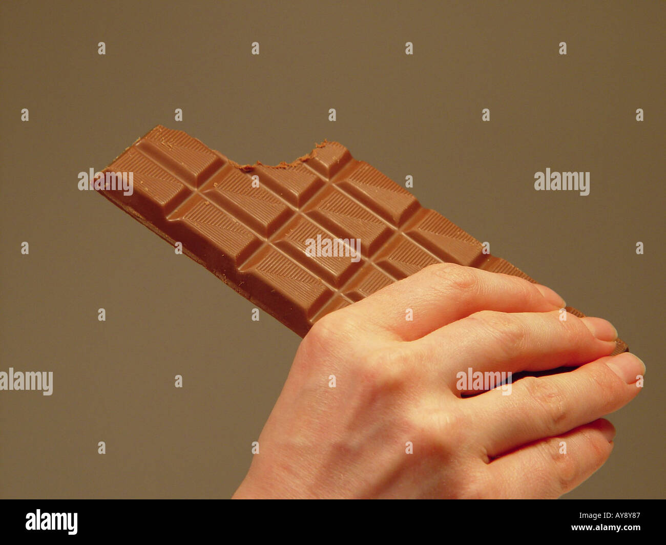 Schokolade in der Hand Stock Photo