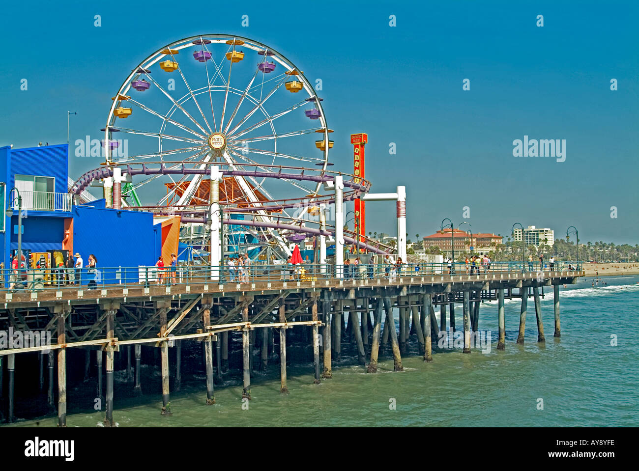 Santa Monica Pier California, CA, USA, US sandy beach, blue water, waves, people  beach hotels, ferris wheel, amusement park, Stock Photo