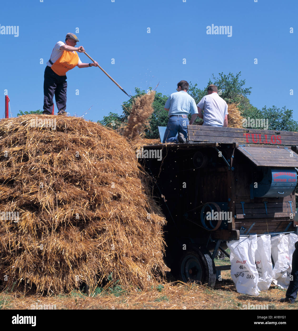 dunmanway, county cork, ireland, recreation of old fashioned farm trashing machinery in rural ireland, community spirit, Stock Photo