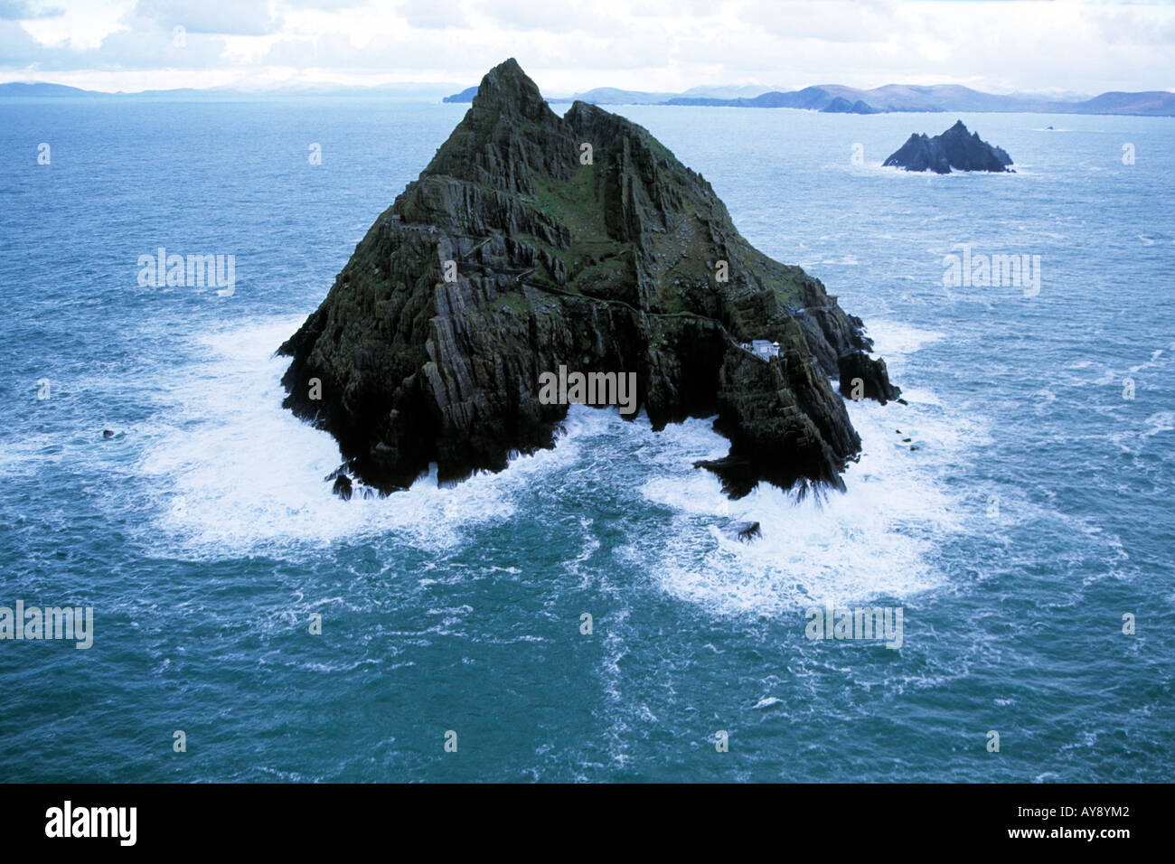 aerial image of an off shore island rock in the atlantic sea off the
