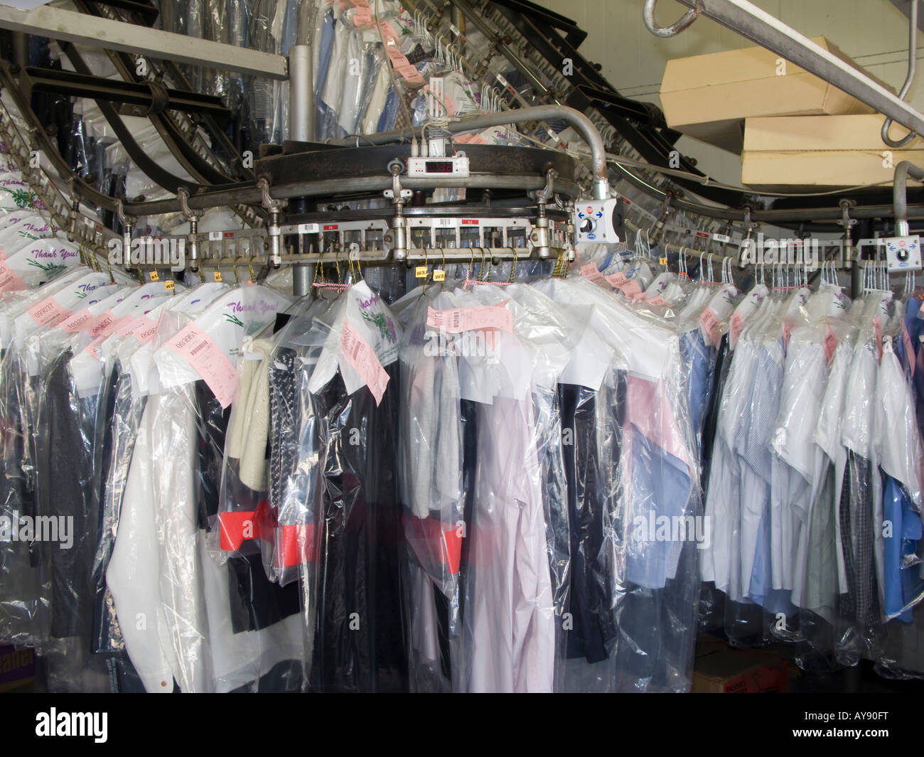https://c8.alamy.com/comp/AY90FT/dry-cleaning-on-movable-conveyor-washington-dc-usa-AY90FT.jpg
