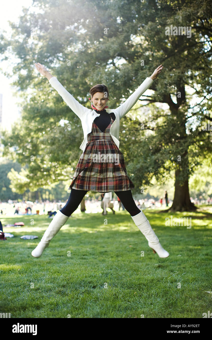 Happy girl jumps in the city hi-res stock photography and images - Alamy