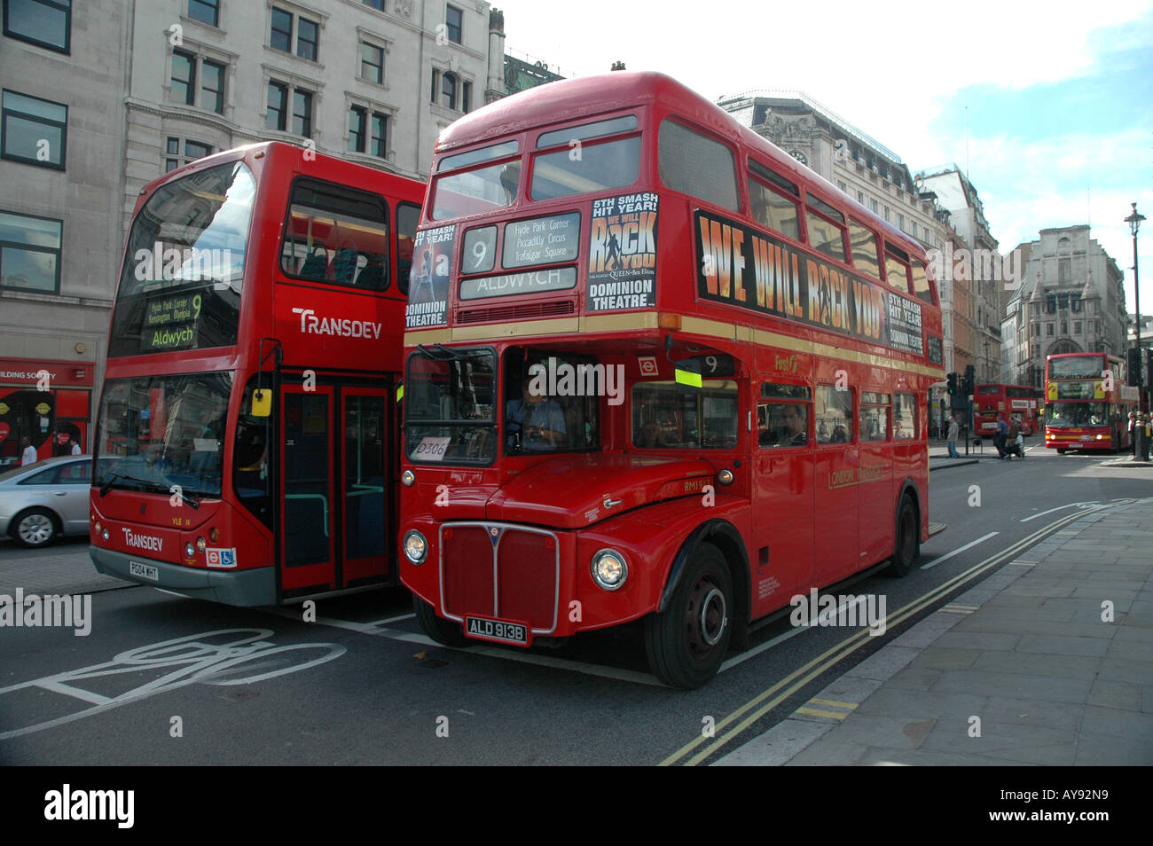 London old and new double decker bus near Trafalgar Square on Cockspur  Street Stock Photo - Alamy