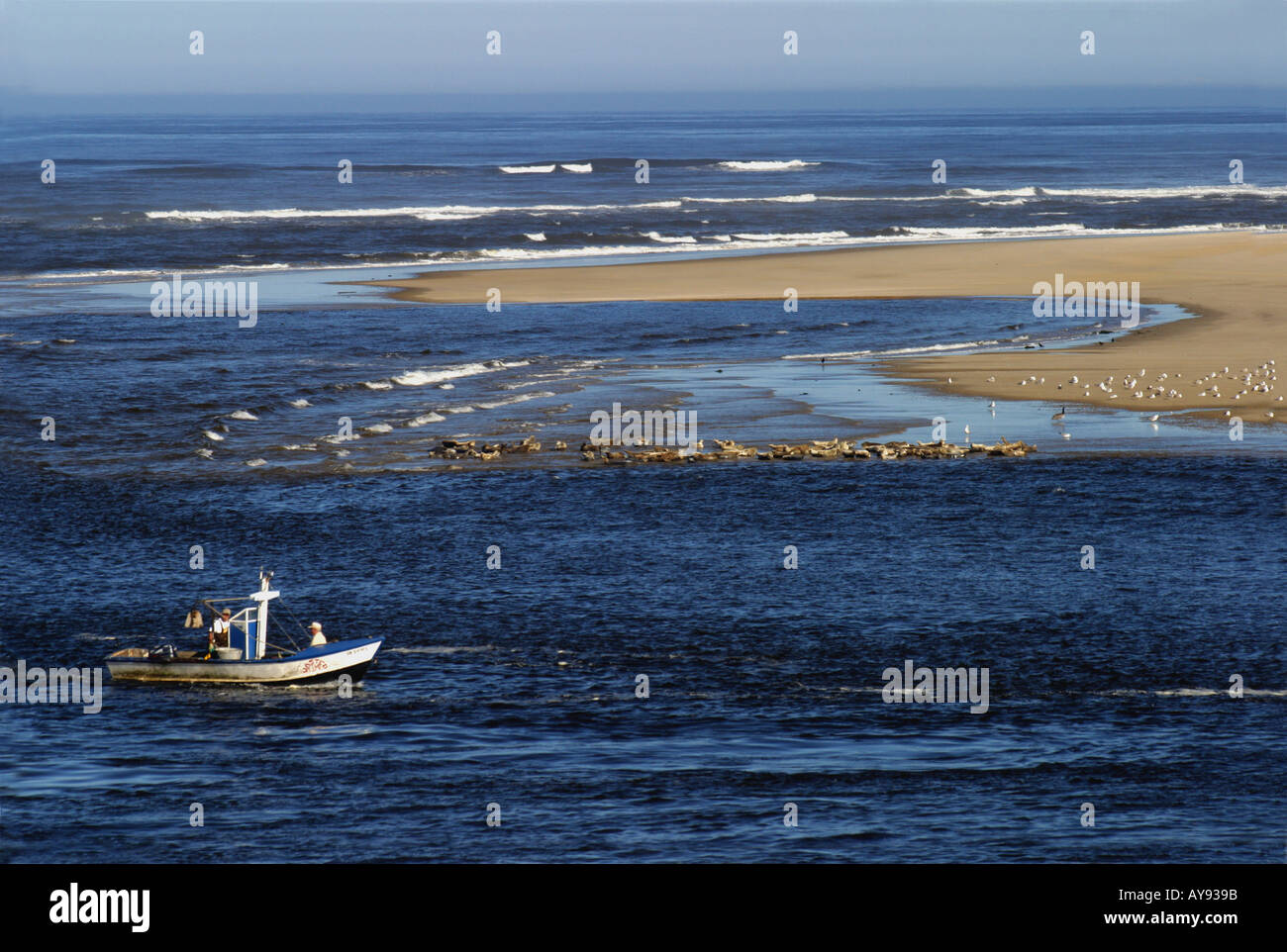 Fisherman in boat entering Alsea Bay in Waldport Oregon Stock Photo Alamy