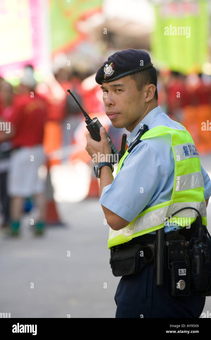 Chinese policeman talking hi-res stock photography and images - Alamy