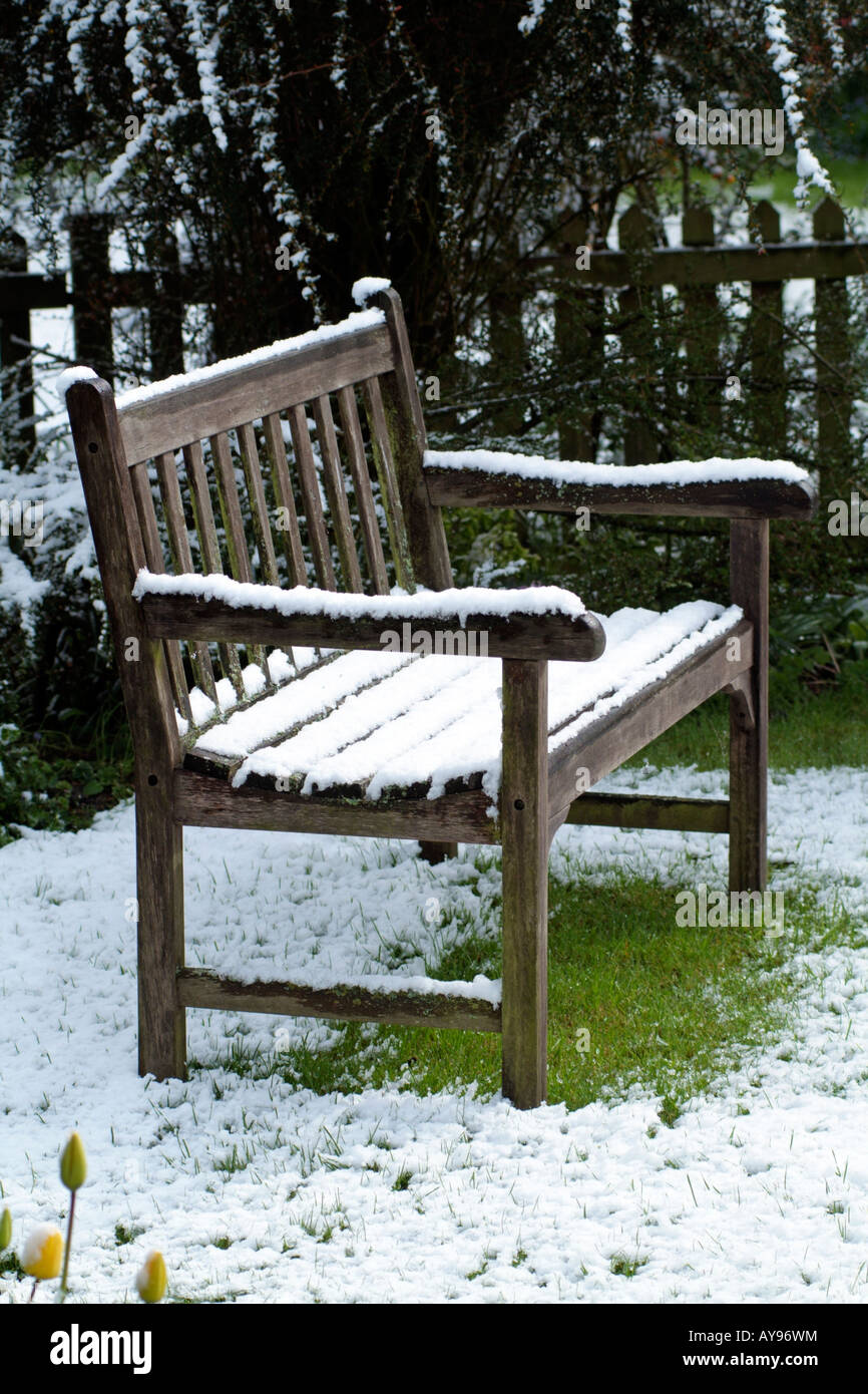 Snow Covered Wooden Garden Seat English Country Garden In Winter
